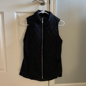 Maurice’s small black vest